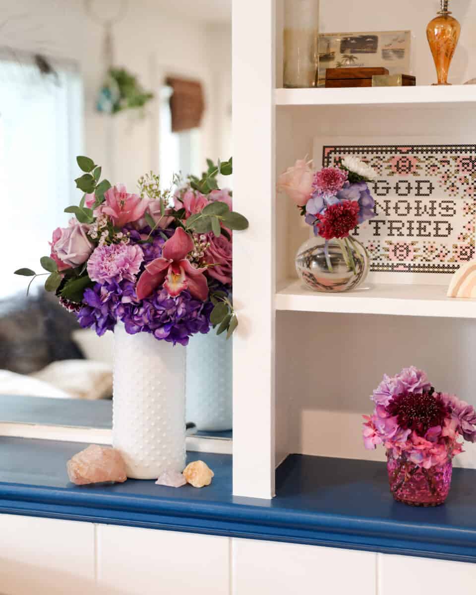 flowers on bookshelf