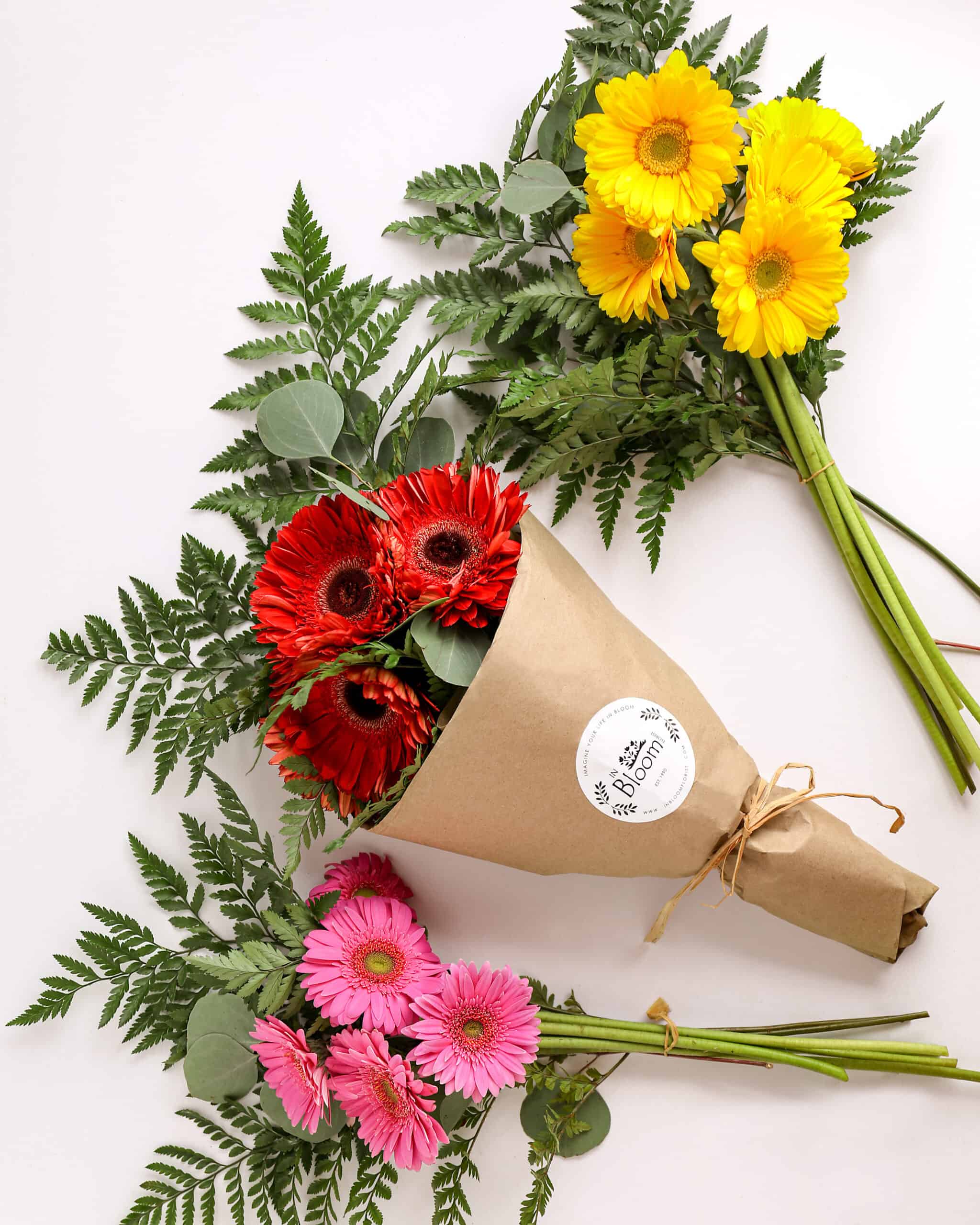  3 bouquets of gerbera daisies from In Bloom florist