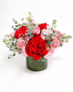 red peonies and pink roses flower arrangement