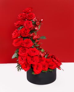 love in roses arrangement - towering red rose arrangement